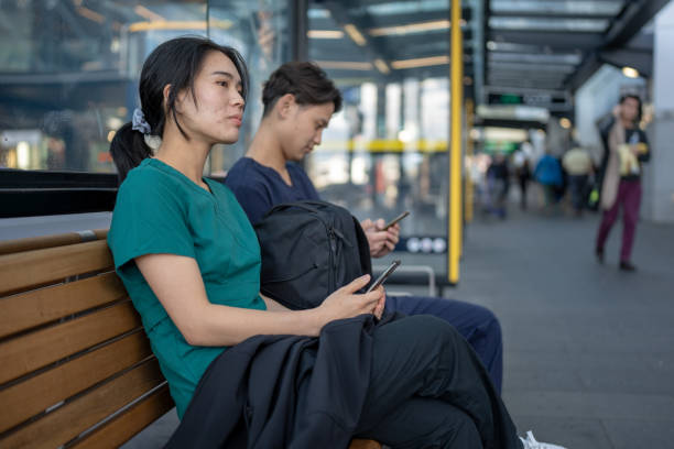 istock Medical Workers Waiting for a Bus 1818184286