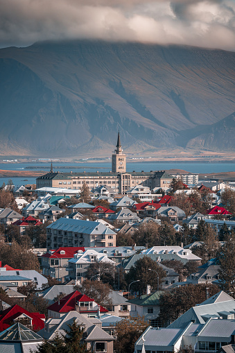 Cityscape of Reykjavík, the capital city of Iceland with the volcanic mountain range Esjan