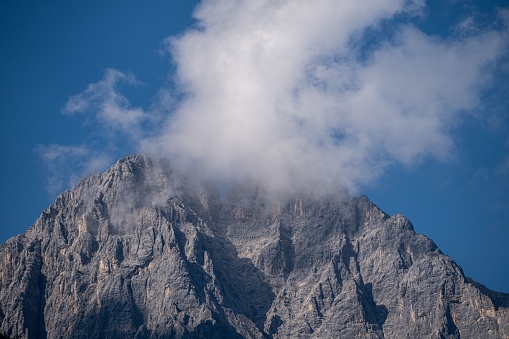 A majestic landscape of rugged mountains and clouds in Leutasch, Tyrol, Austria