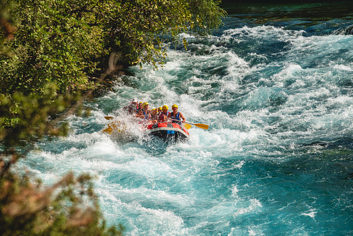 Antalya, Turkey - August 10, 2023: Rafting on a big rafting boat on the river in Antalya Koprulu Canyon.