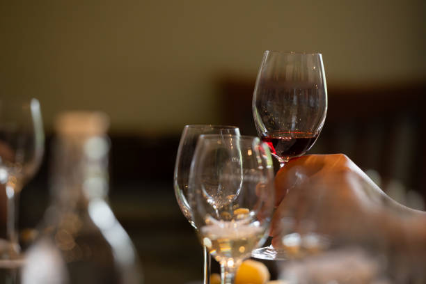 istock Wine glasses on a table in a restaurant, shallow depth of field 1818203075