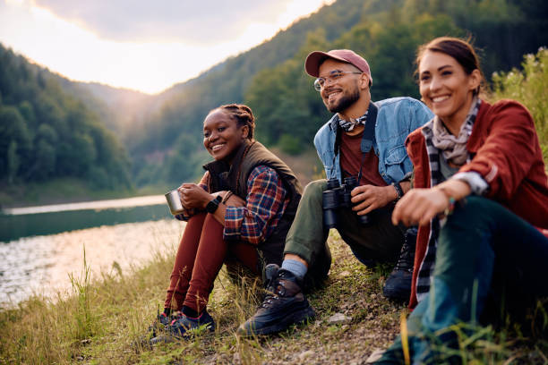 istock Multiracial group of friends enjoying while spending their weekend in nature. 1818221347