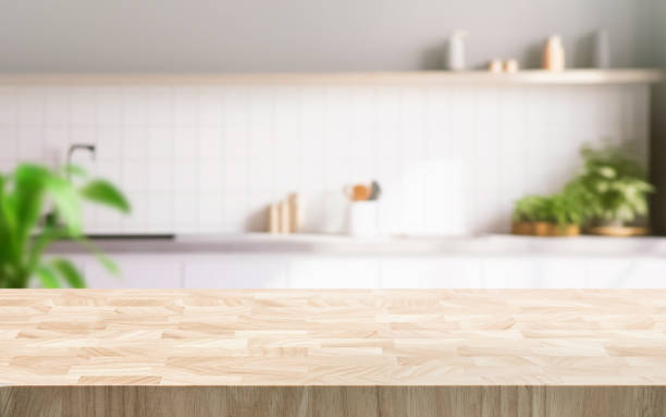 istock Selective focus.End grain wood counter table top on blur white minimal kitchen background 1818226552