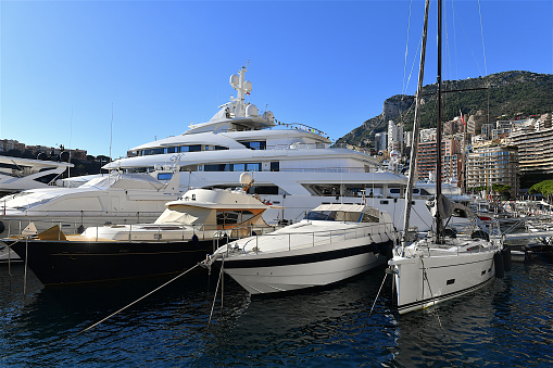 Monaco-ville, Monaco-11 22 2023: Luxury yachts moored in the Hercules harbor in Monaco.