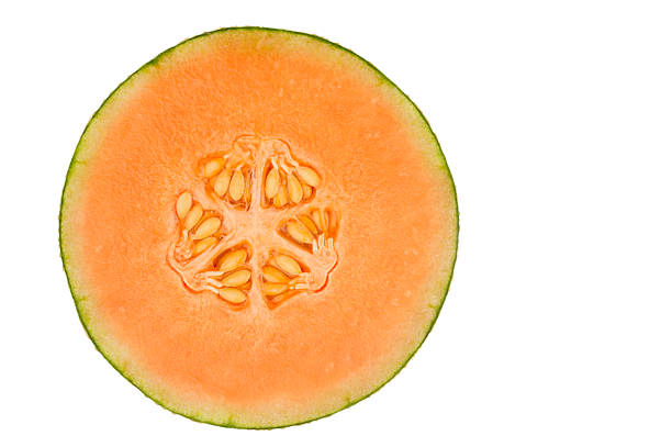 One sliced orange honeydew melon isolated in white background