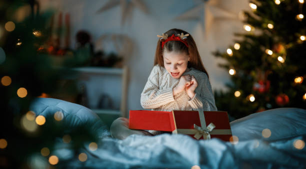 istock girl with Christmas gift 1818264409