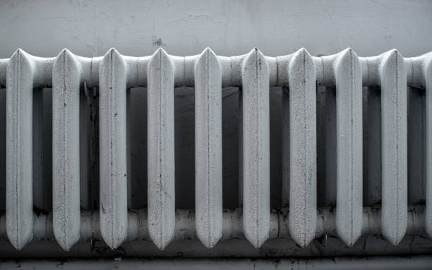 istock Vintage heater on white wall 1818274276