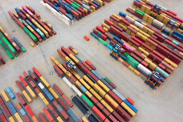istock Mobile crane vehicles and containers in the harbor 1818279654