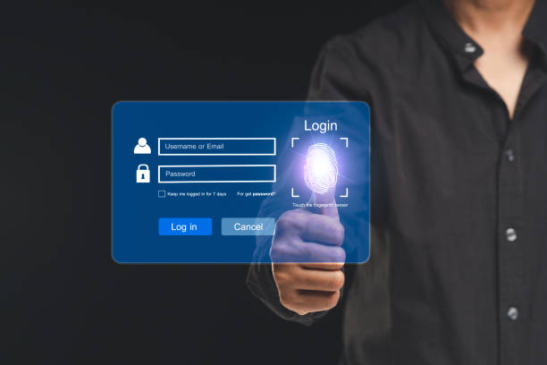 istock Log in to the system with a fingerprint on the virtual screen while standing on a black background 1818287847