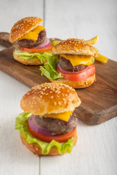 istock Delicious hamburgers on wood 1818293873