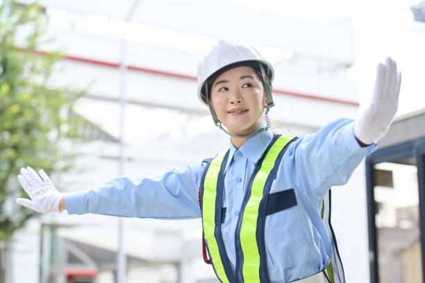 istock Asian woman working as a security guard 1818296637