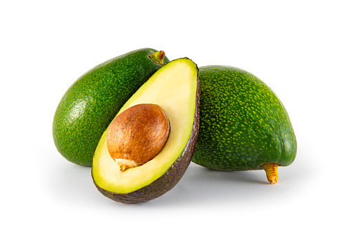 Fresh avocado cut out on white background