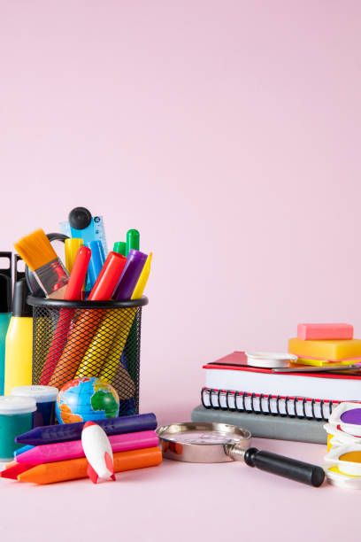 istock School Supplies on Pink Background 1818299788