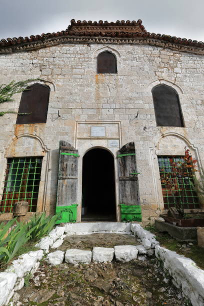 Front facade of the Dollma Tekke or Tekke of Dollme -Teqja e Dollmes- or Haxhi Mustafa Baba Tekke, Sufi shrine, Dollma family's burial site located in the city castle's southern corner. Kruja-Albania.
PLEASE NOTE THAT THE IMAGE DEPICTS A PUBLIC, OPEN ACCESS MONUMENT: NO FEES, NO ENTRY RESTRICTIONS, NO PHOTOGRAPHY PROHIBITION. el dollma tekke o hajji mustafa baba tekke, santuario sufí construido en 1780 perteneciente a la orden islámica beqtashi. kruje-albania-049
tenga en cuenta que la imagen representa un monumento pÚblico de acceso abierto: sin tarifas, sin restricciones d