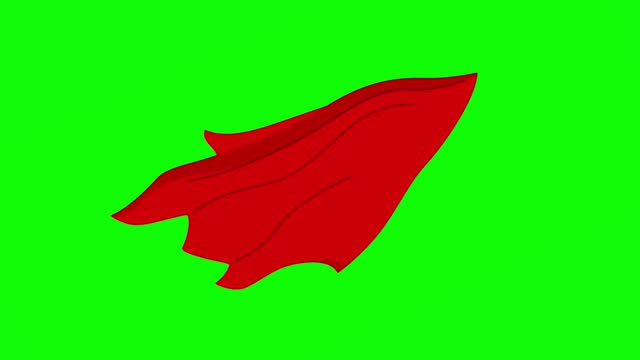Red Cape or cloak on green background. Superhero cloak. Silk flying cape.