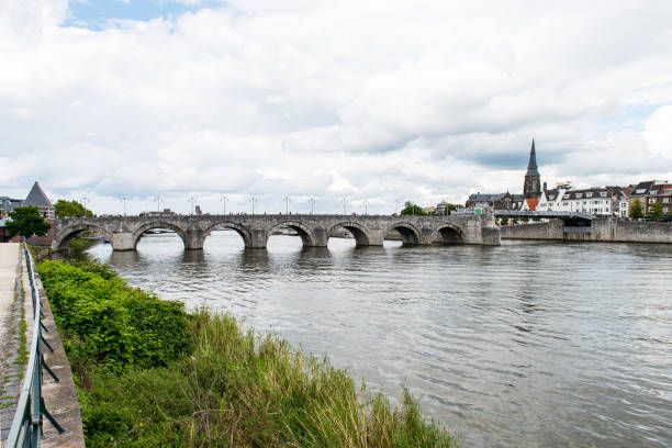 View of the old Saint Servatius bridge over the river Meuse in Maastricht, capital of Limburg. The bridge is the oldest bridge in The Netherlands and is 1 of 4 bridges connecting the east and west part of the city.