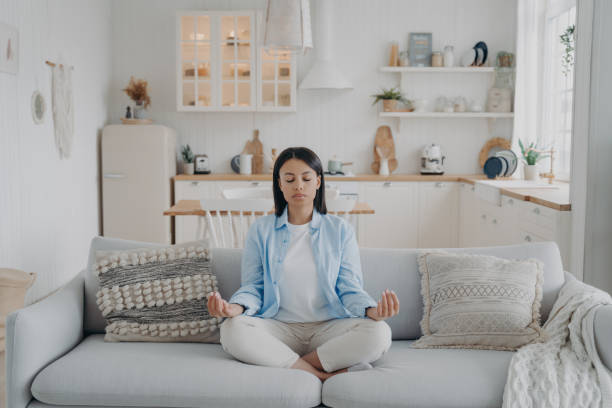 istock Peaceful meditation in a bright, cozy home setting, embracing tranquility and self-care 1818320241