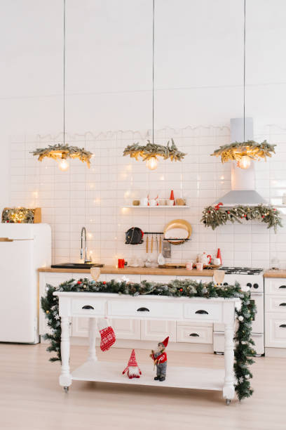 istock Winter cozy kitchen with red decorations, christmas kitchen table and utensils 1818326278