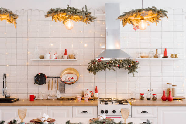 istock Christmas white scandinavian kitchen interior with red decor and lights 1818330724