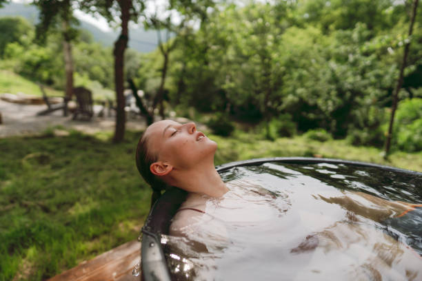 istock Young woman taking an ice bath 1818330729