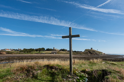 Holy Cross marks the spot where St Cuthbert built a house on a small island at Holy Island Lindisfarne.