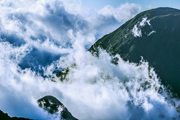 mountains in the clouds stock photo
