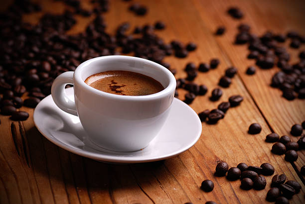 istock Espresso on a wooden table with coffee beans 181836962