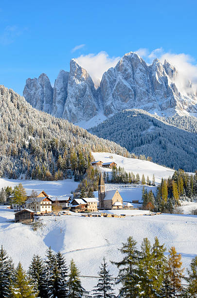 istock Santa Maddalena covered in winter snow 181837323