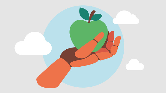 A robotic hand holds an apple and offers it