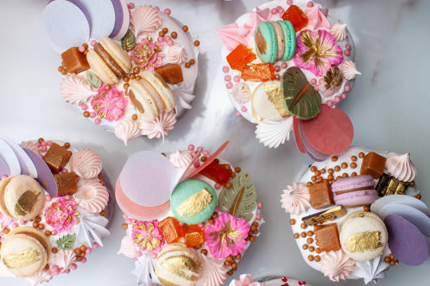 istock Beautiful traditional Orthodox Easter cakes decorated with glaze, meringues, chocolate, nuts, toffees, macaroons, flowers and jelly 1818394574