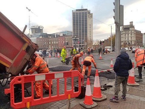 24th November 2023, Dublin, Ireland. Part of O'Connell Street and bridge being resurfaced following the Dublin riot after the attack on the children at Gaelscoil Colaiste Mhuire, Parnell Square.
