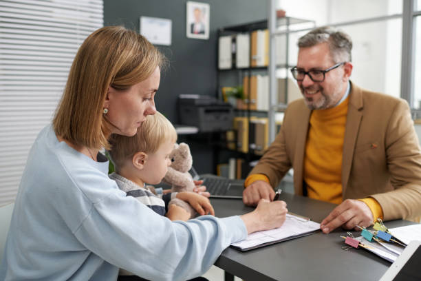 istock Woman filing documents for social benefits 1818414029