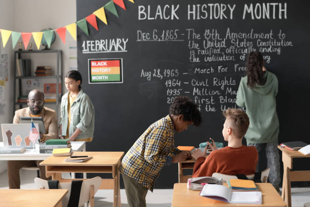 istock School children studying at primary school 1818417918