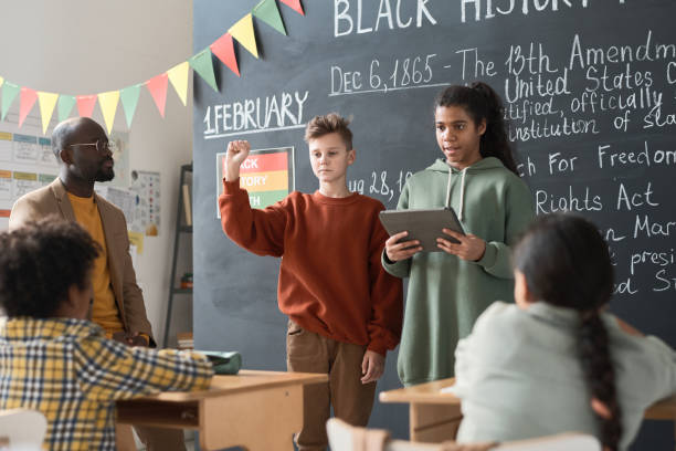 istock School children telling about Black History Month at lesson 1818421451