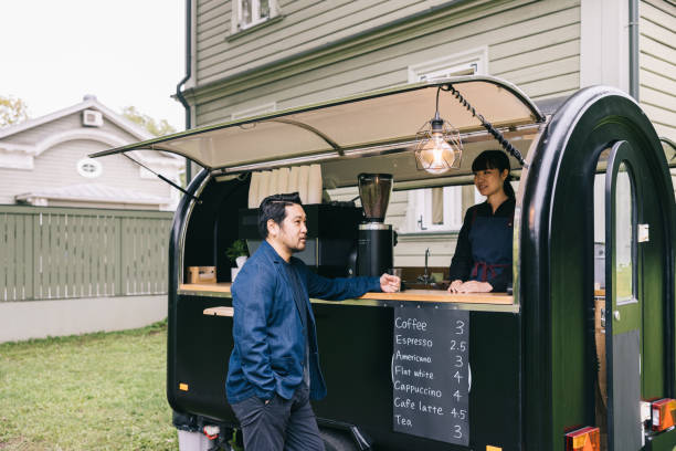 istock Japanese customer and coffee trailer barista having a chat 1818422614