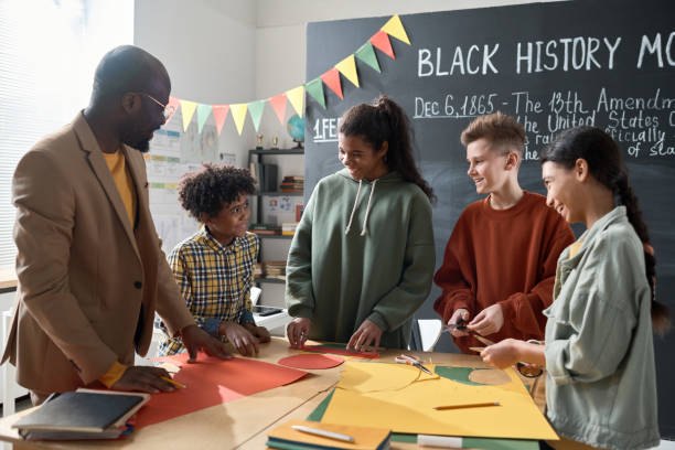 istock Children making handicraft with teacher 1818425989