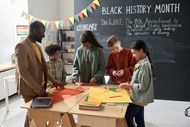 istock Children with teacher preparing for Black History Month 1818425990