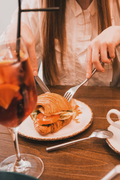 istock Croissant with egg on a plate, Breakfast in the cafe 1818428162
