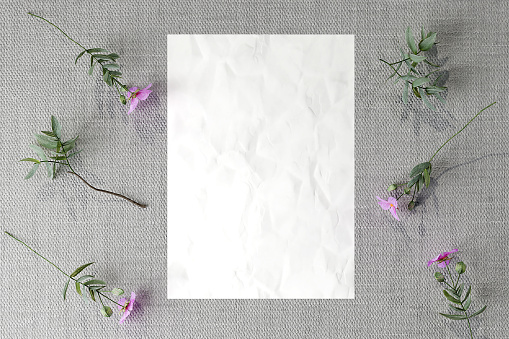 Poster mockup with natural plants rustic look