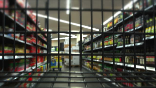 T/L Rushing With Shopping Cart Through Supermarket POV