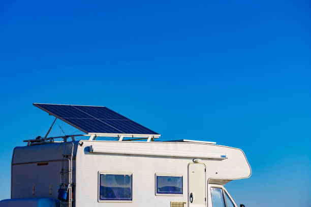 istock Caravan with tilt solar panels on roof. 1818468151