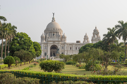 Kolkata,west bengal,India,13 april 2022  view of the famous victoria memorial with garden, a large marble building in central kolkata, at the time of sunrise.