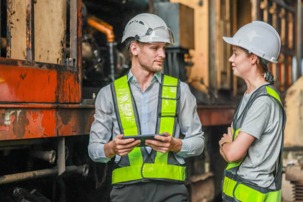 istock Software engineers upgrade locomotive energy app. Using real-time monitoring, data usage insights 1818488009
