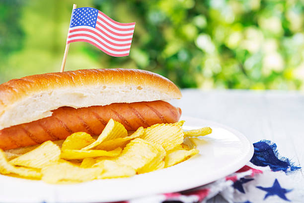 istock Hot dog on an outdoor table in bright light 181849851