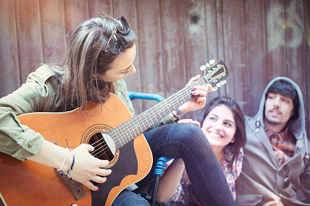 istock Teenager playing guitar 181849862