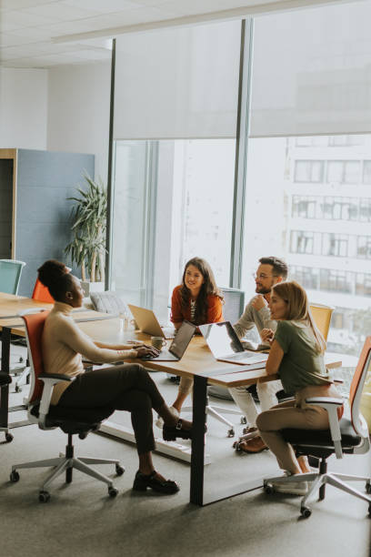 istock Young multiethnic startup team working in the modern office 1818503062