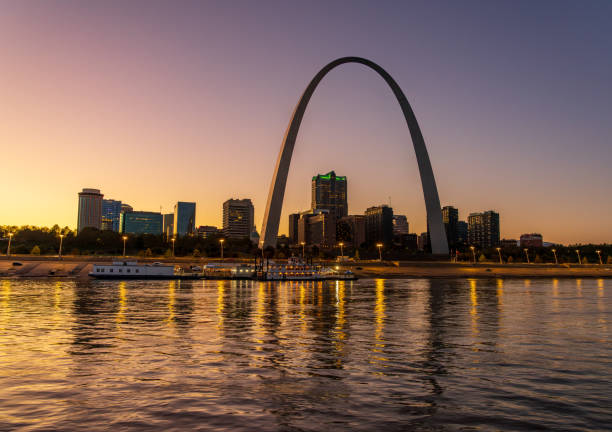 Reflections of St Louis and Gateway Arch in Mississippi River Reflections of St Louis and Gateway Arch in Mississippi River jefferson national expansion memorial park stock pictures, royalty-free photos & images