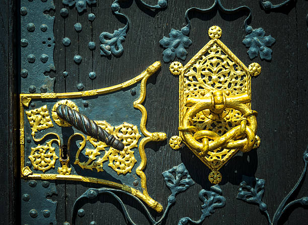 istock golden door handle on black wood 181850750