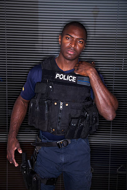 istock Police officer in tactical suit 181851109