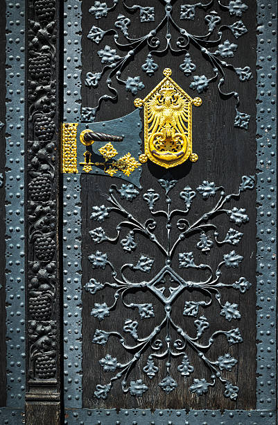 istock golden door handle on black wood 181851242